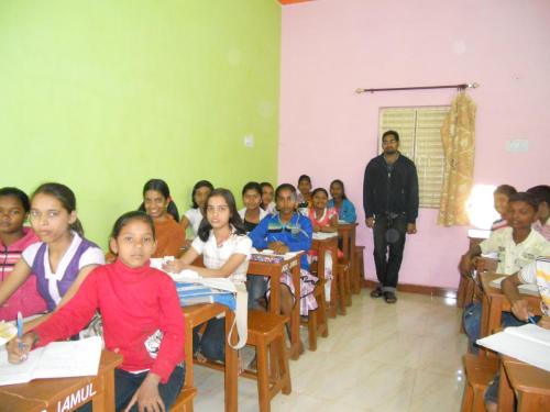 Students  with Piyush sir(HSI volunteer) attending MAT classes