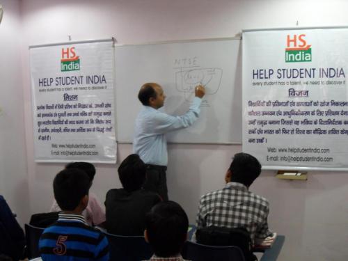 Avnish Sir informing students about importance of NTSE exam.