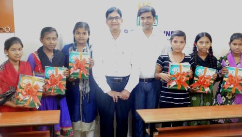 Token of appreciation to students for performing well in exams.